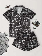Womens Halloween pyjamas in black skull and crossbones print, short-sleeve top and shorts