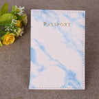 Blue Marbelle faux leather passport holder