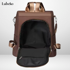 Beige anti theft travel bag side view
