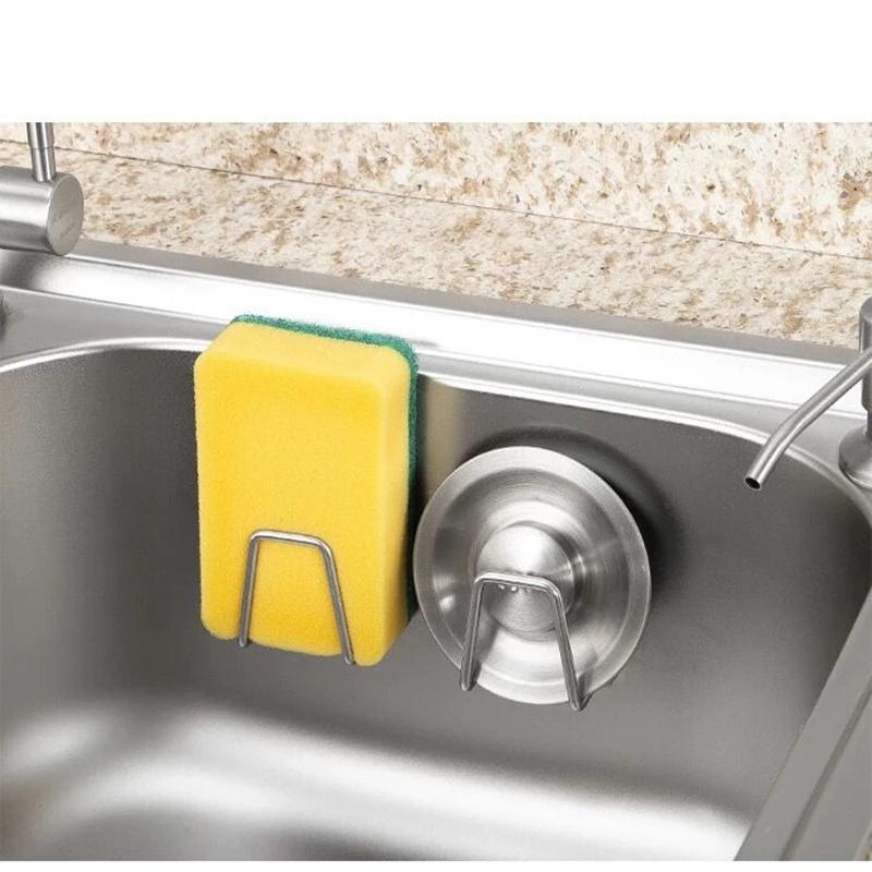 Self adhesive sponge caddy holding a cleaning sponge
