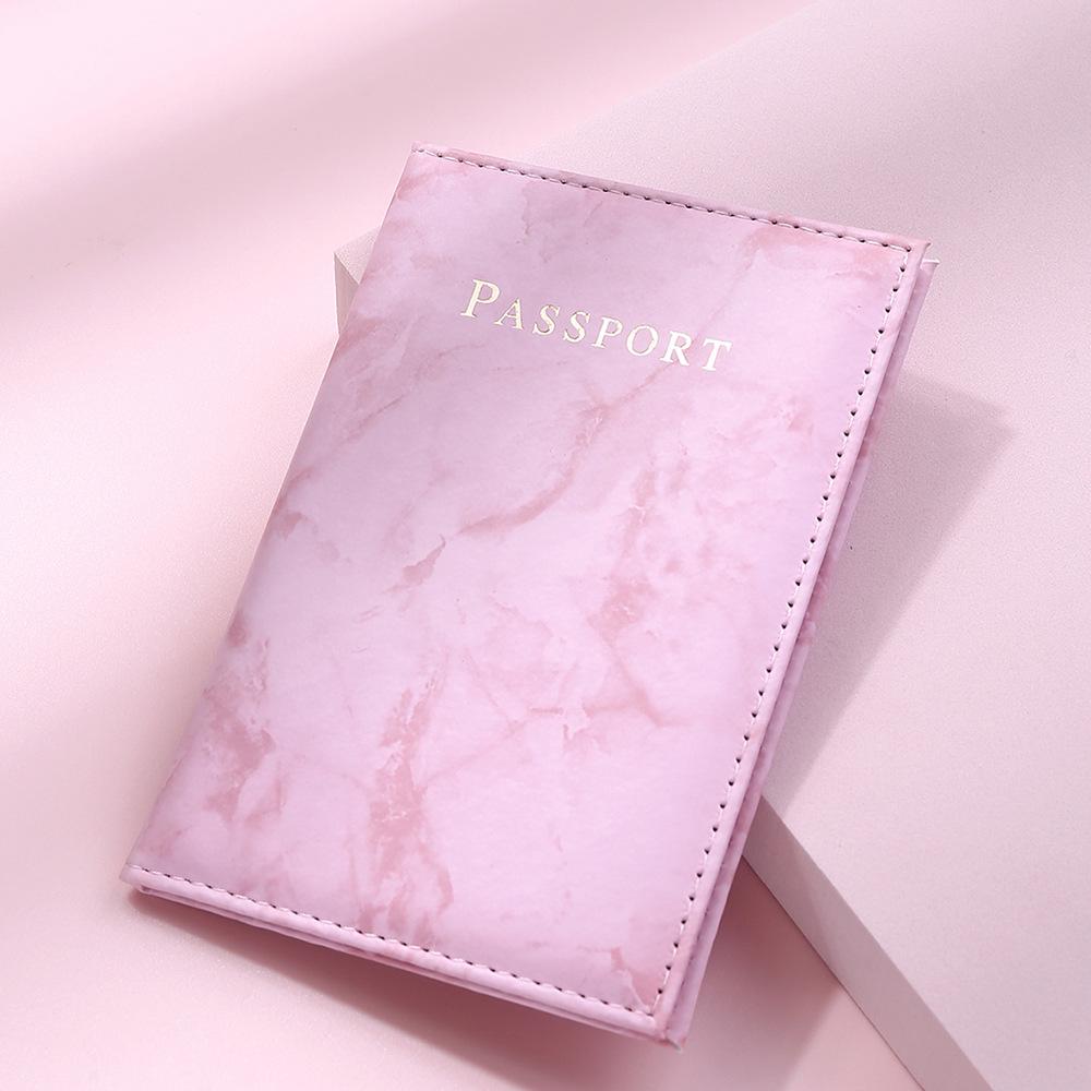 Pink Marbelle faux leather passport holder