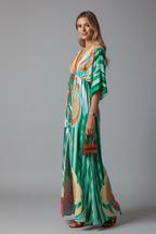 Bohemian print maxi dress in green swirl print, side view