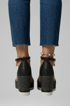 Black cushioned orthopedic sandals, side view