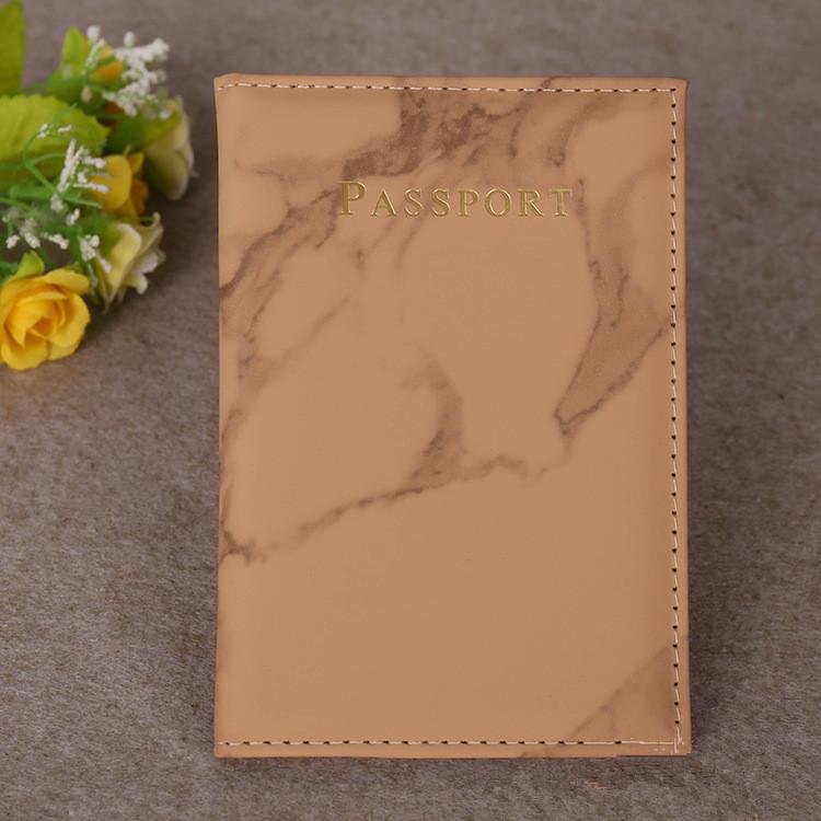 Brown Marbelle faux leather passport holder