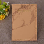 Brown Marbelle faux leather passport holder