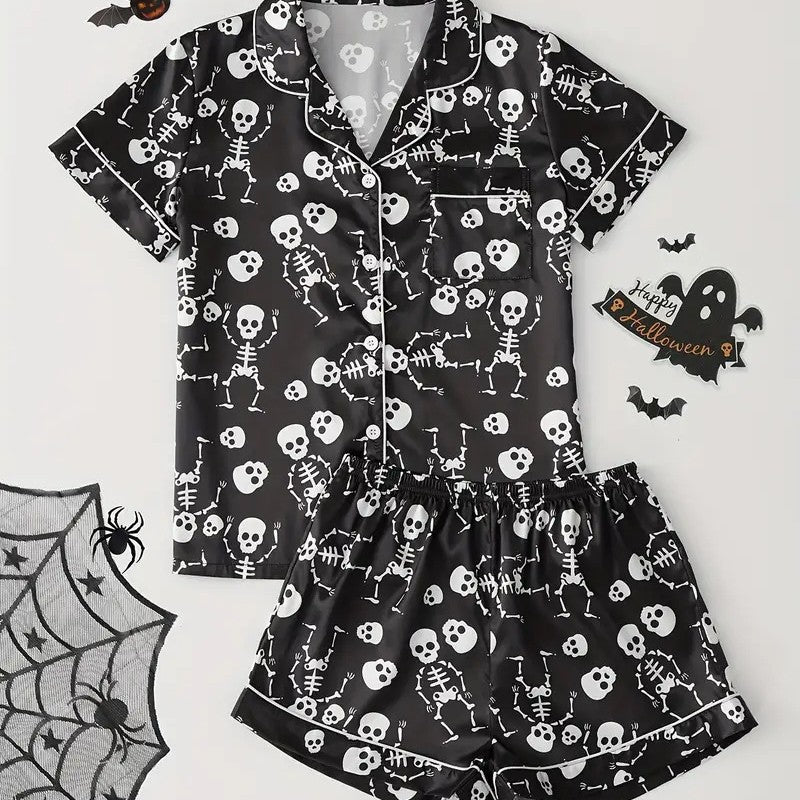 Womens Halloween pyjama set with black skull print, front view