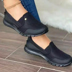Black Janne extra-wide slip-on shoes