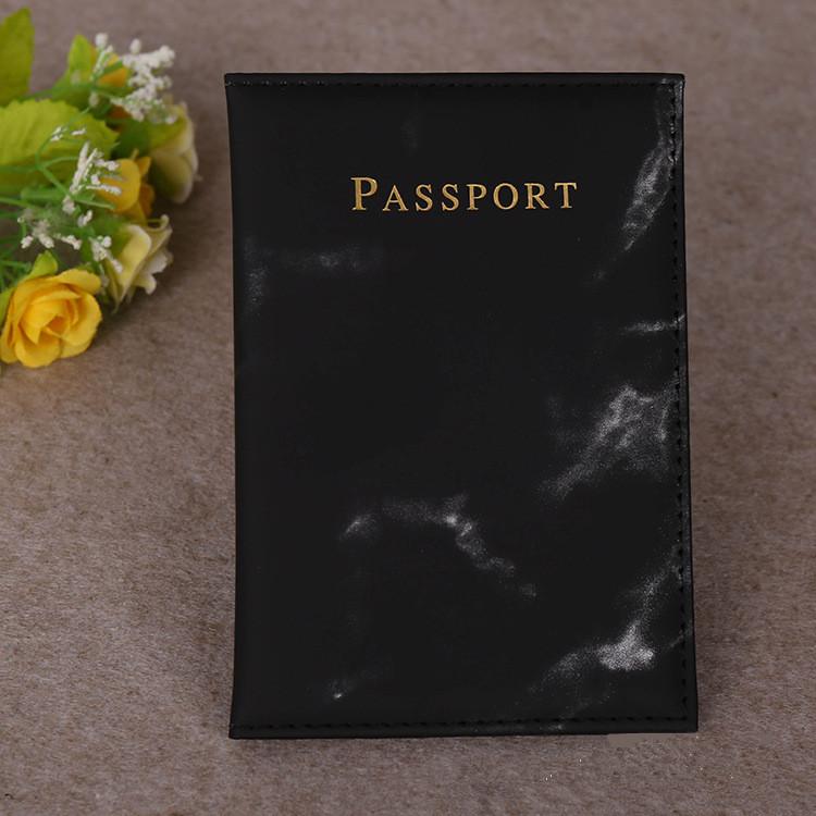 Black Marbelle faux leather passport holder