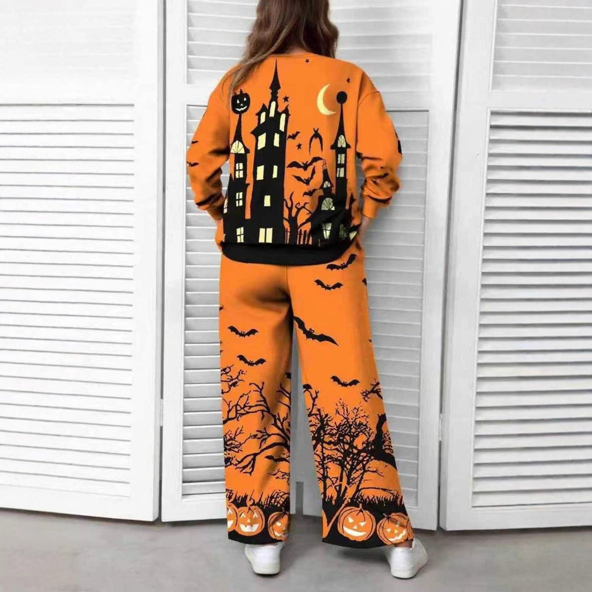 Haunted Manor Halloween pyjama set worn by a model, back view