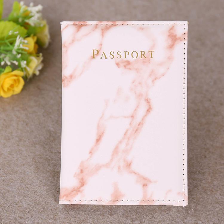 Red Marbelle faux leather passport holder