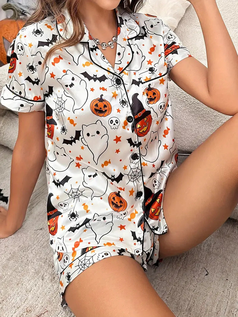 Womens Halloween pyjama set with ghost and pumpkin print, styled view