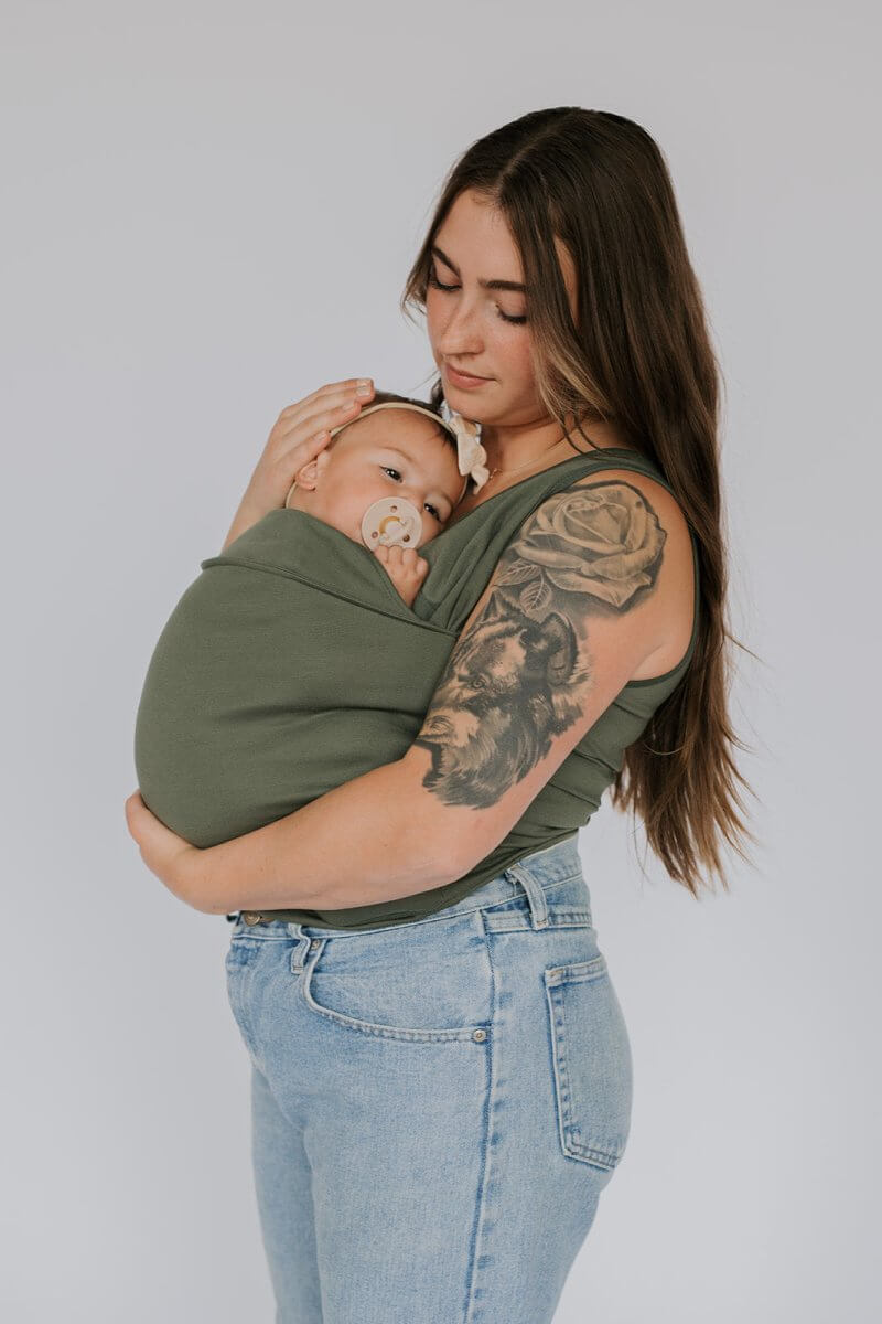 Woman wearing the Army Green CuddleNest kangaroo shirt