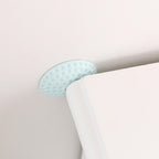 HushPad door handle bumper protecting a wall surface