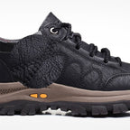 Close-up of men's arch support shoe sole with non-slip tread