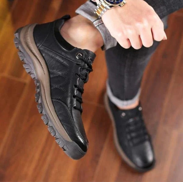Man wearing black arch support shoes