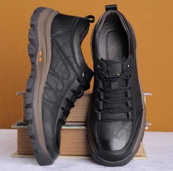 Pair of men's black arch support shoes