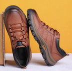 Pair of men's brown arch support shoes