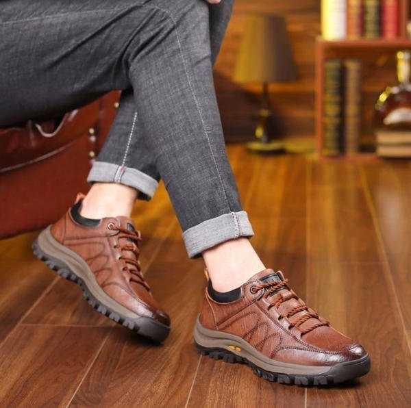 Man wearing brown arch support shoes