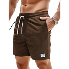 Brown swim shorts elastic waist and drawcord, detail