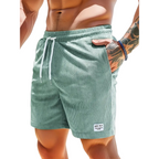 Cyan swim shorts elastic waist and drawcord, detail