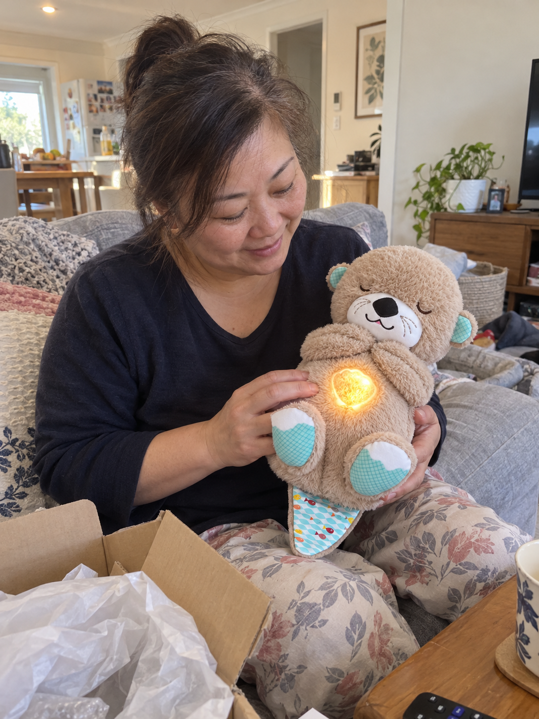 Customer lifestyle photo for Snoozie | Calming Otter Sleep Buddy